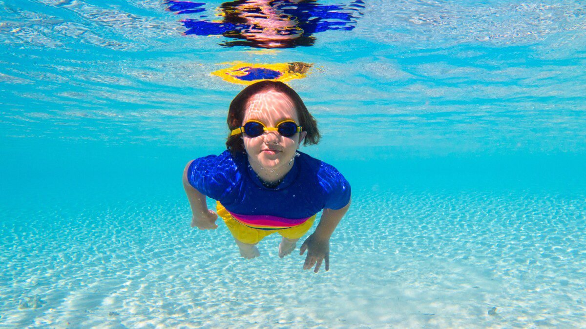 Snorkelers in clear water at the Daymaniyat Islands