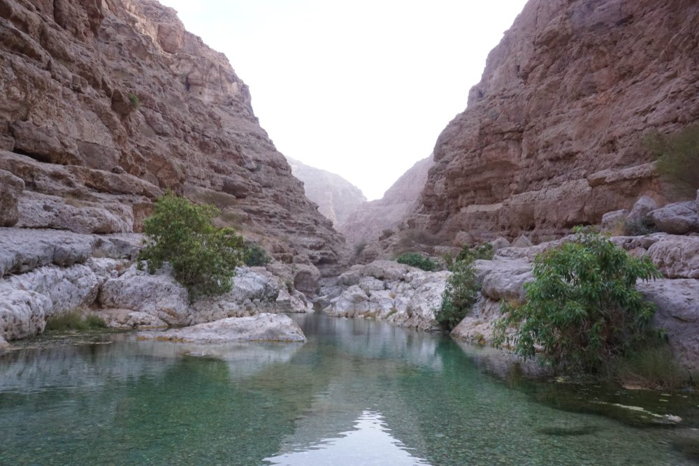 Turquoise pools and rocky canyon at Wadi Shab in Oman