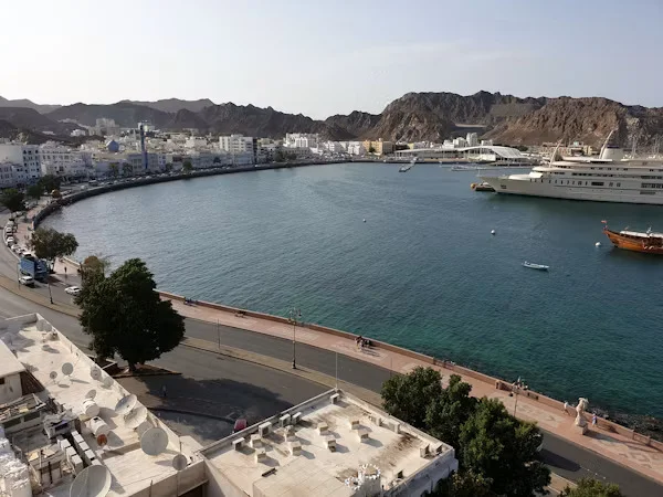 Muscat city and coastline in Oman with mountains in the background